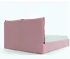 A pink upholstered bed frame with a white mattress, viewed from the side and back. Produktbild-Vorschau