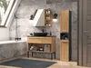 A modern bathroom with a tiled wall, bathtub, vanity, and a tall cabinet. Náhľad obrázku produktu