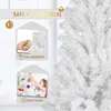 A close-up of a white artificial Christmas tree with decorative elements and text overlays highlighting safety features. Produktbild-Vorschau