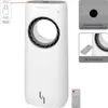 A white tower fan with a gray accent ring around the fan opening. It is shown with a remote control and informational callouts. Produktbild-Vorschau