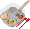 A multi-compartment frying pan with a glass lid, containing a pancake, bacon, and a fried egg. Also includes red silicone cooking utensils. Náhľad obrázku produktu