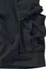 Close-up of the cargo pockets on a pair of black shorts. Produktbild-Vorschau