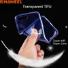 A hand holding a transparent blue phone case against a black background, with feathers and text overlays. Produktbild-Vorschau