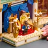 A close-up view of a LEGO® Disney set depicting characters from "Beauty and the Beast" in a ballroom setting. Produktbild-Vorschau