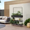 An outdoor patio scene with a modern planter stand, sofa, and wooden deck. Podgląd zdjęcia produktu