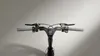Close-up of the handlebars and digital display of an electric scooter. Produktbild-Vorschau
