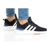 A person wearing Adidas Racer Tr21 K shoes. Podgląd zdjęcia produktu
