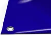 A close-up view of a blue PVC tarp with a grommet. Voir les images du produit