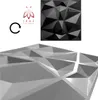 A collage of 3D wall panels, one black and one white, with a logo and a circular arrow icon. Produktbild-Vorschau