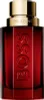 A studio shot of a red perfume bottle with gold accents. Produktbild-Vorschau