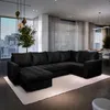 A modern living room with a large sectional sofa, large windows with blinds, and decorative lighting. Produktbild-Vorschau