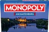 The image shows the box of the Monopoly Aschaffenburg board game, featuring a nighttime cityscape with a castle and river. Produktbild-Vorschau