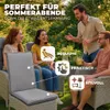 People relaxing on garden furniture outdoors. Produktbild-Vorschau