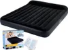 A black inflatable mattress with its packaging and instructions. Podgląd zdjęcia produktu