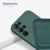 A close-up view of a green phone case, showing the camera cutout and the interior texture. Produktbild-Vorschau