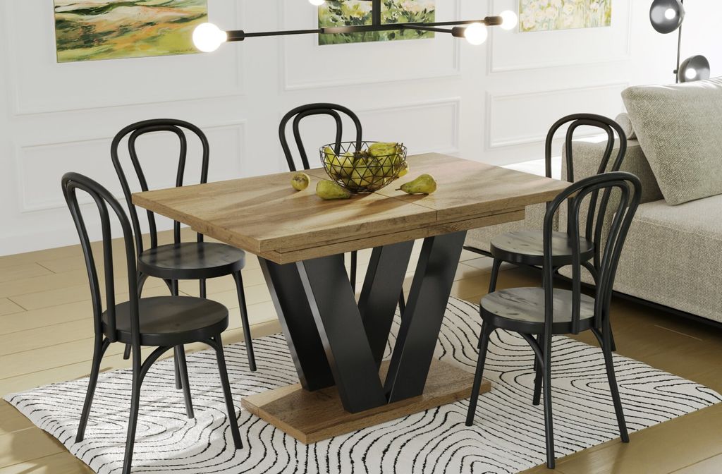 A dining table with chairs in a well-lit room.