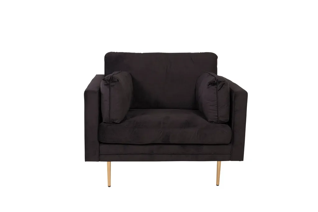 Fauteuil en velours noir Boom idéal pour un coin lecture cosy chic