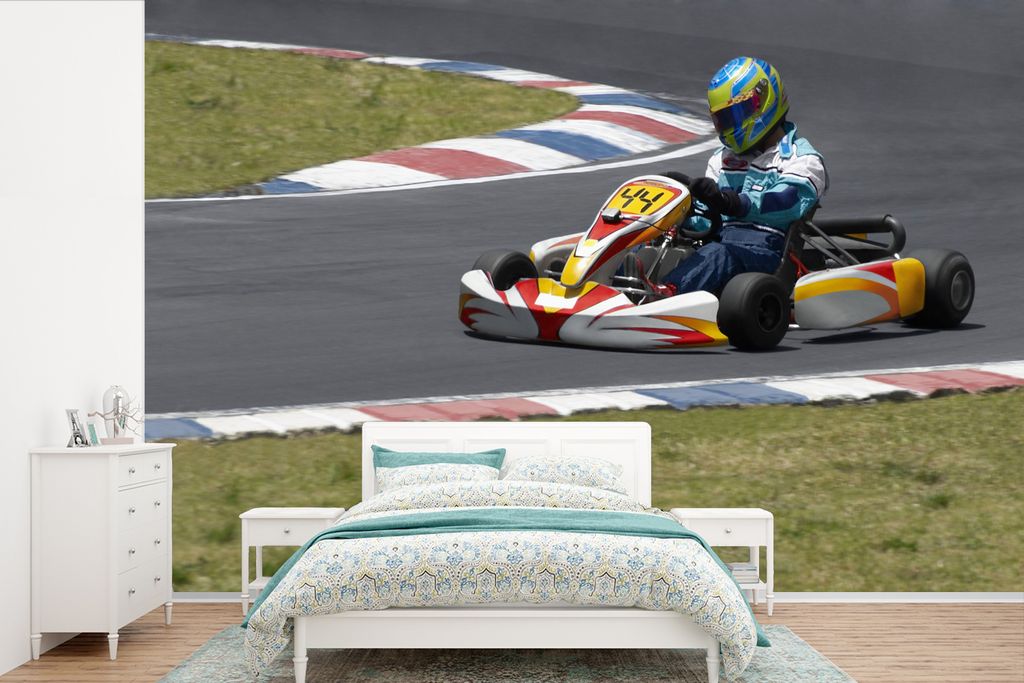 MuchoWow Fototapete für Wohnzimmer oder Schlafzimmer Wandtapete Vinyl Motivtapete Der Go-Kart-Fahrer rast auf einem Rundkurs durch die Kurve - 3...