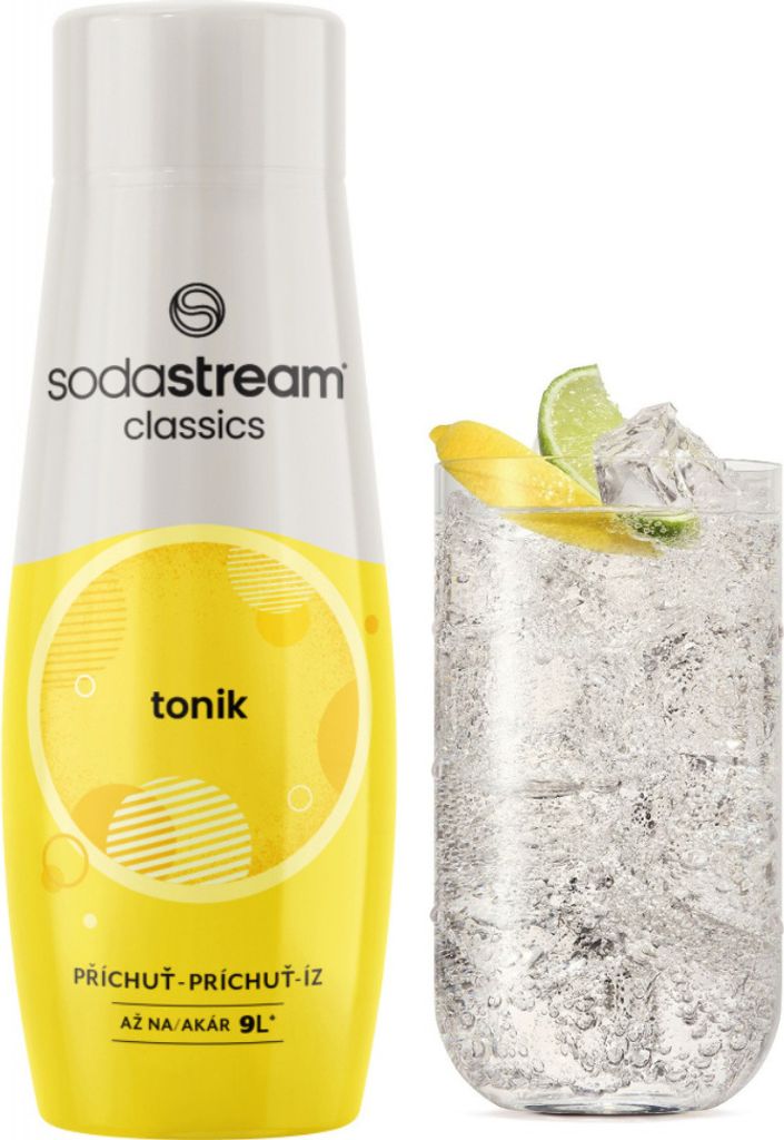 A bottle of SodaStream Tonic syrup next to a glass of tonic water with ice and fruit garnishes.