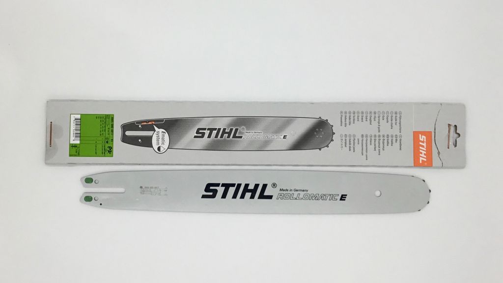 A new STIHL chainsaw guide bar is shown in its packaging and also displayed separately.
