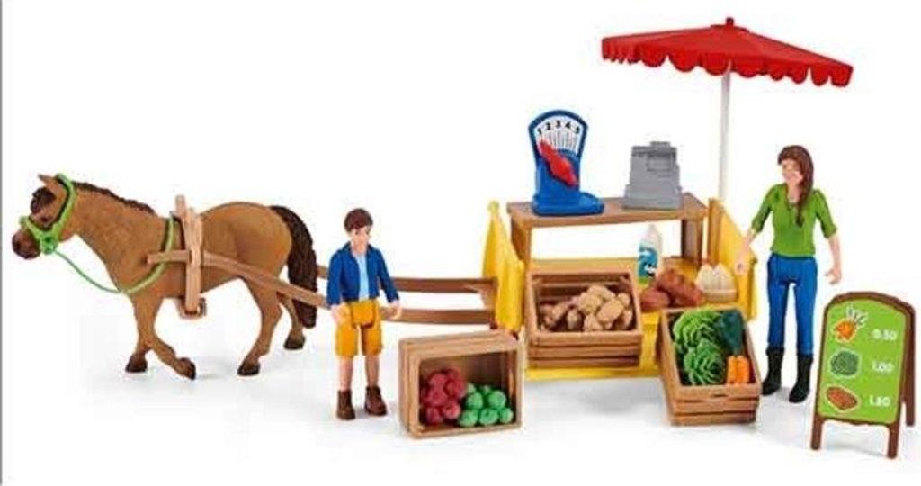 A toy farm stand with a horse-drawn cart, figures, and produce.
