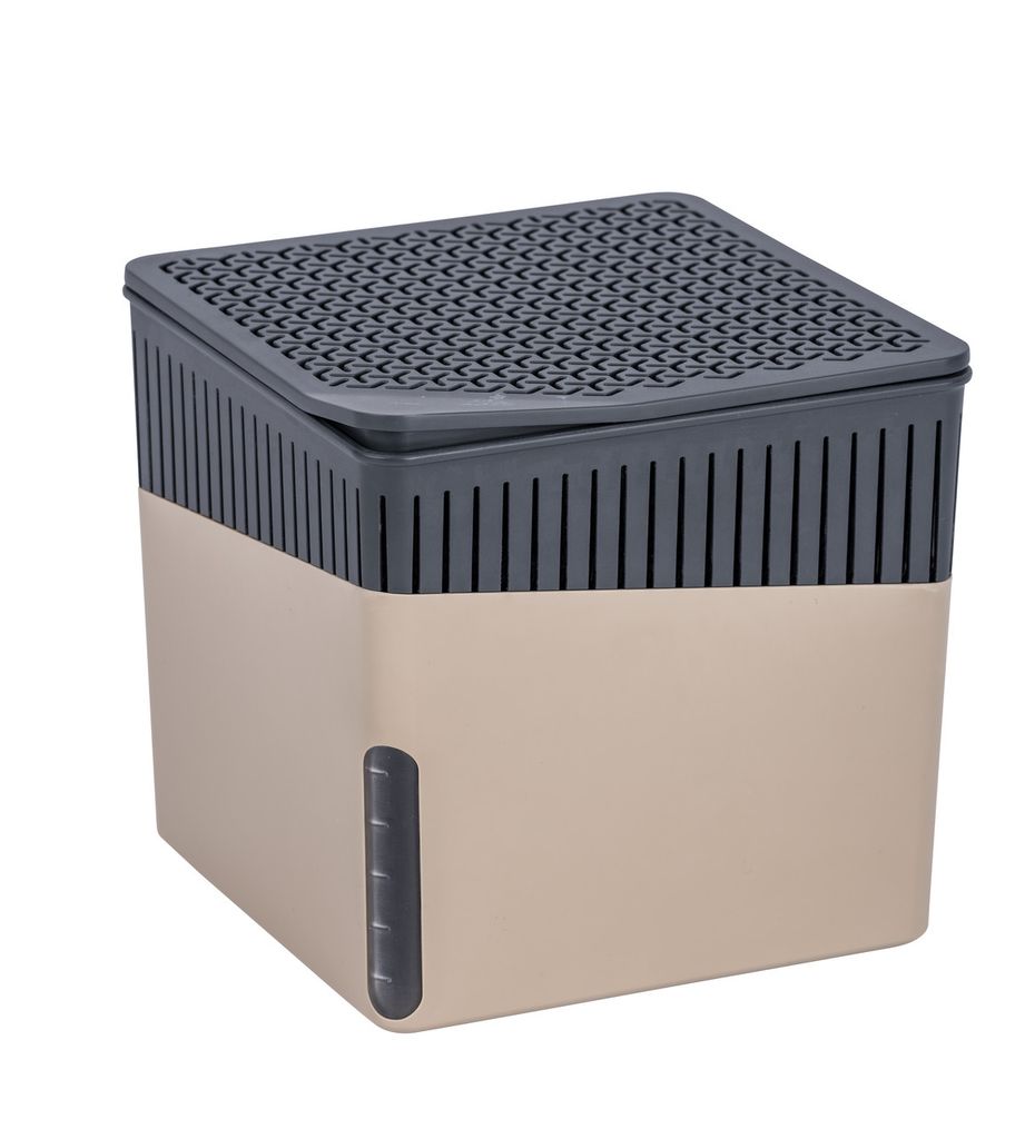 A beige and gray dehumidifier cube with a perforated lid and a clear indicator window on the side.
