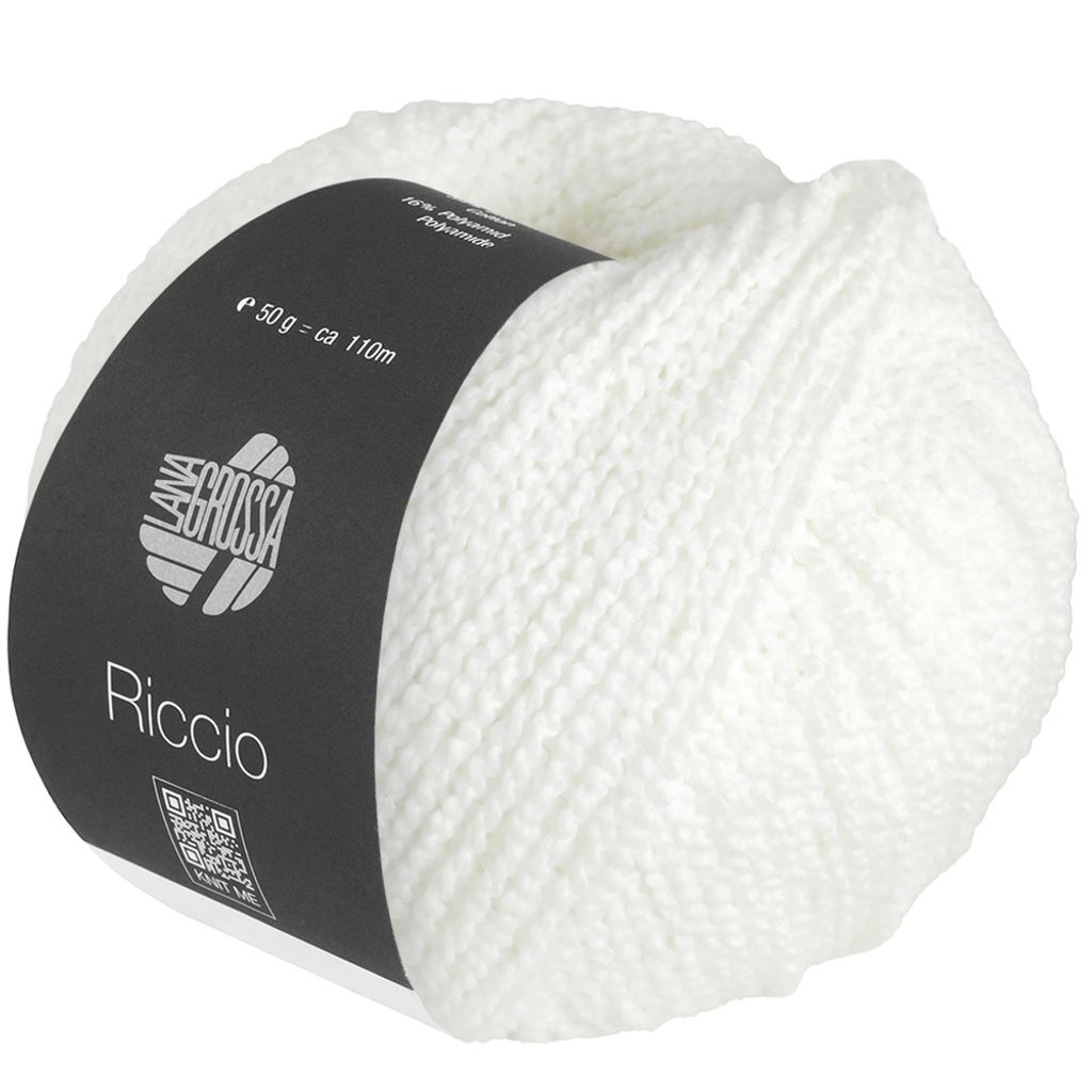 A ball of white yarn with a black label.