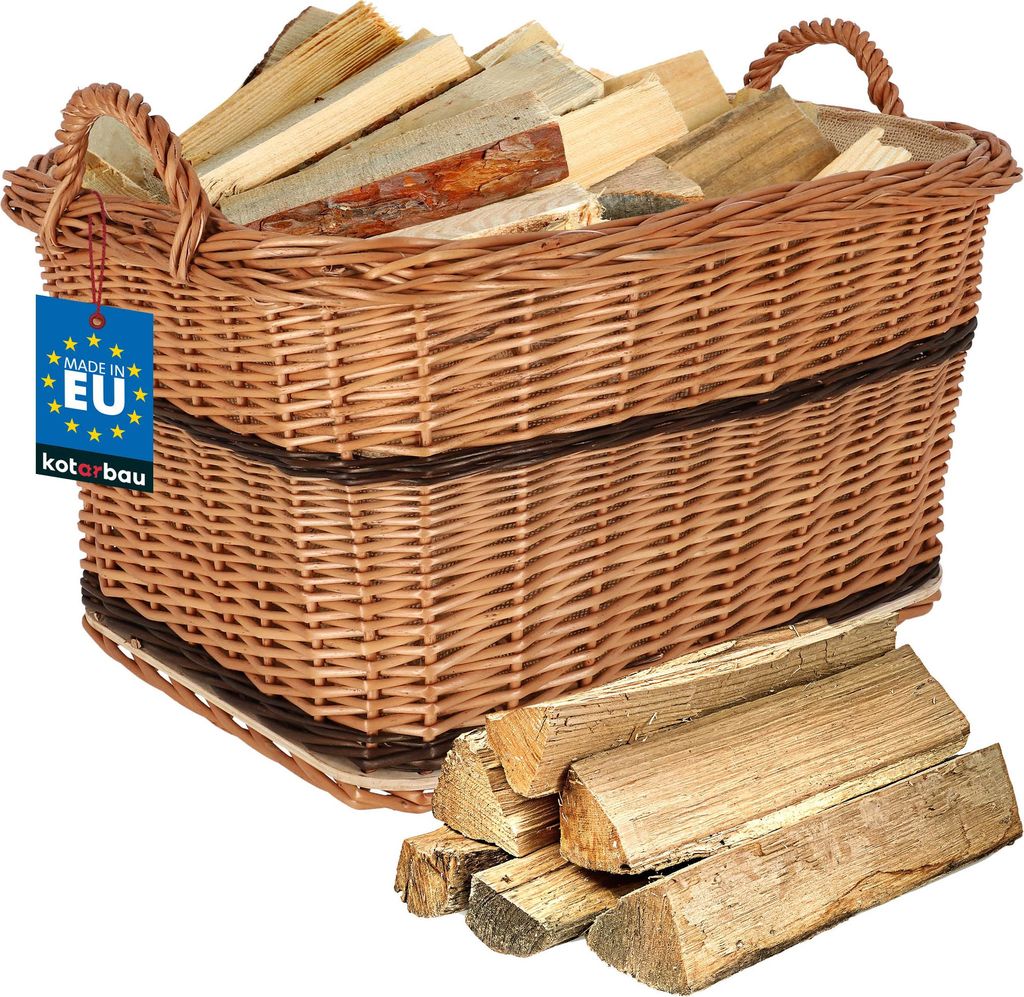A wicker basket filled with firewood, with a few pieces of firewood stacked in front of it.