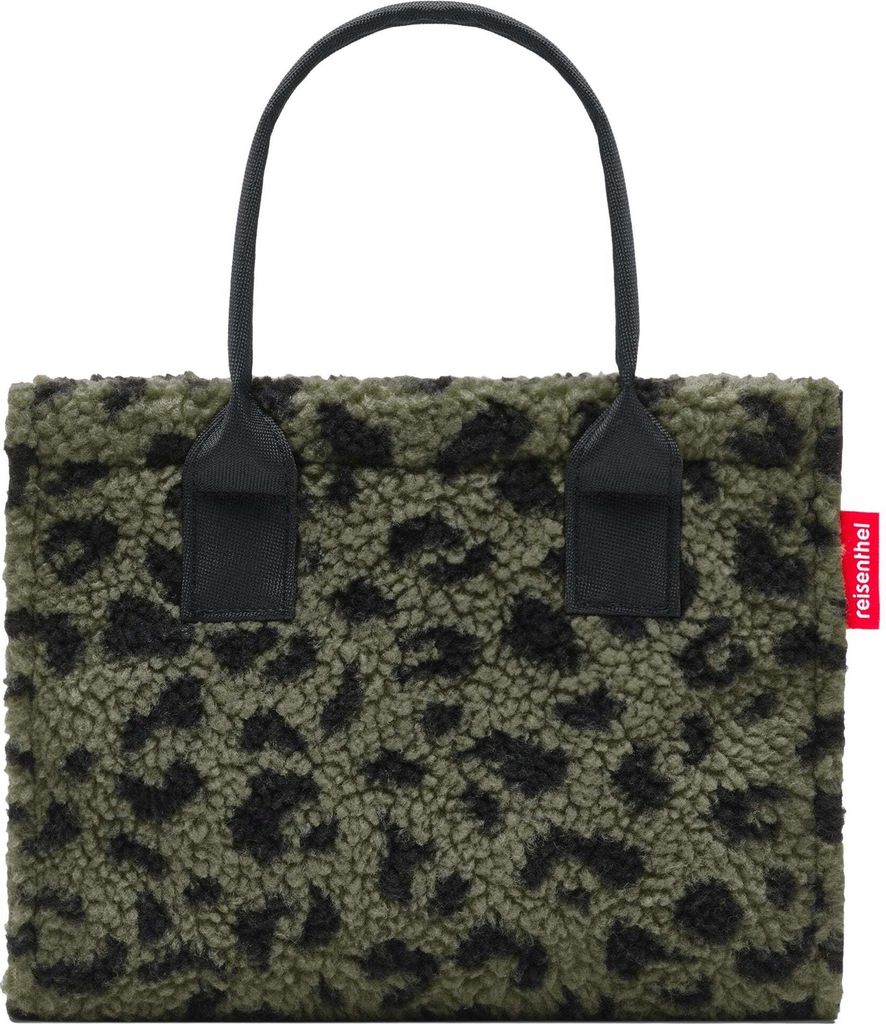A fluffy tote bag with a leopard print pattern.