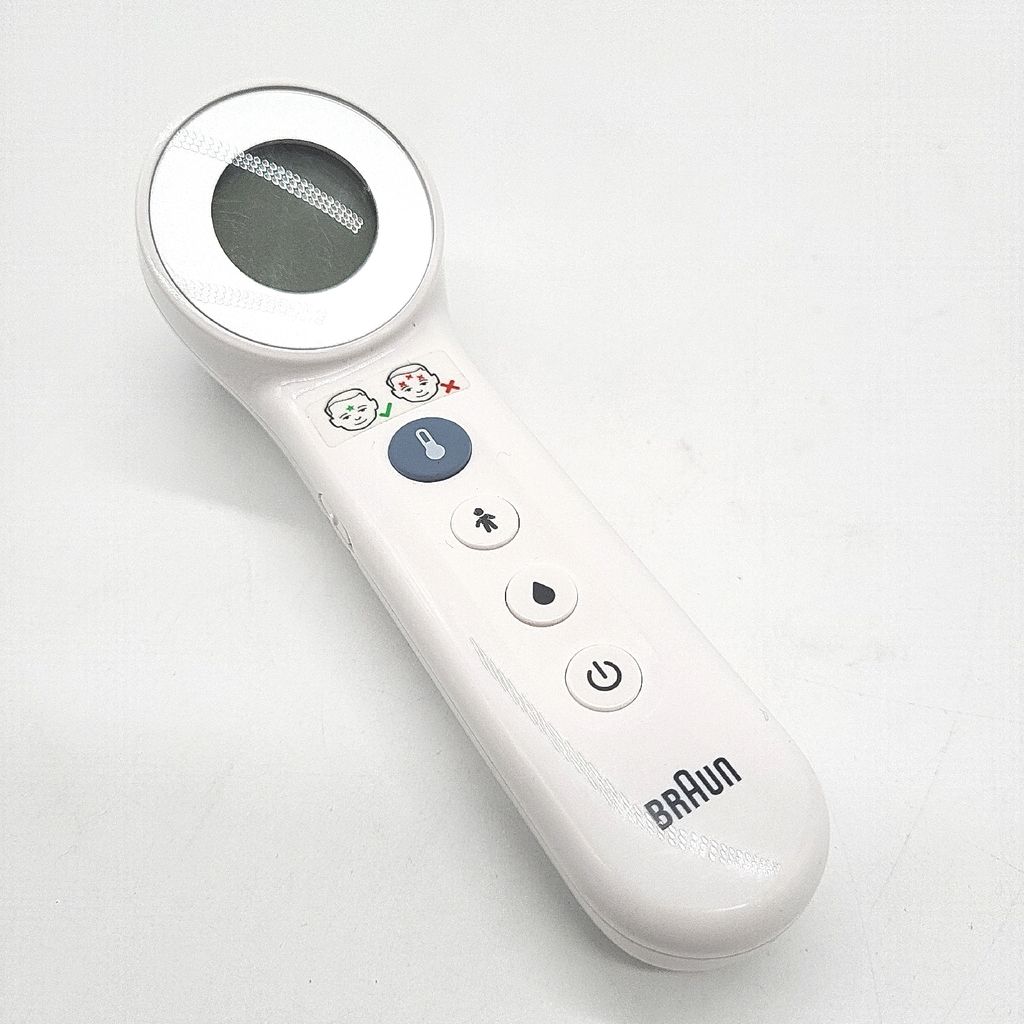 A white Braun digital thermometer is shown against a white background.