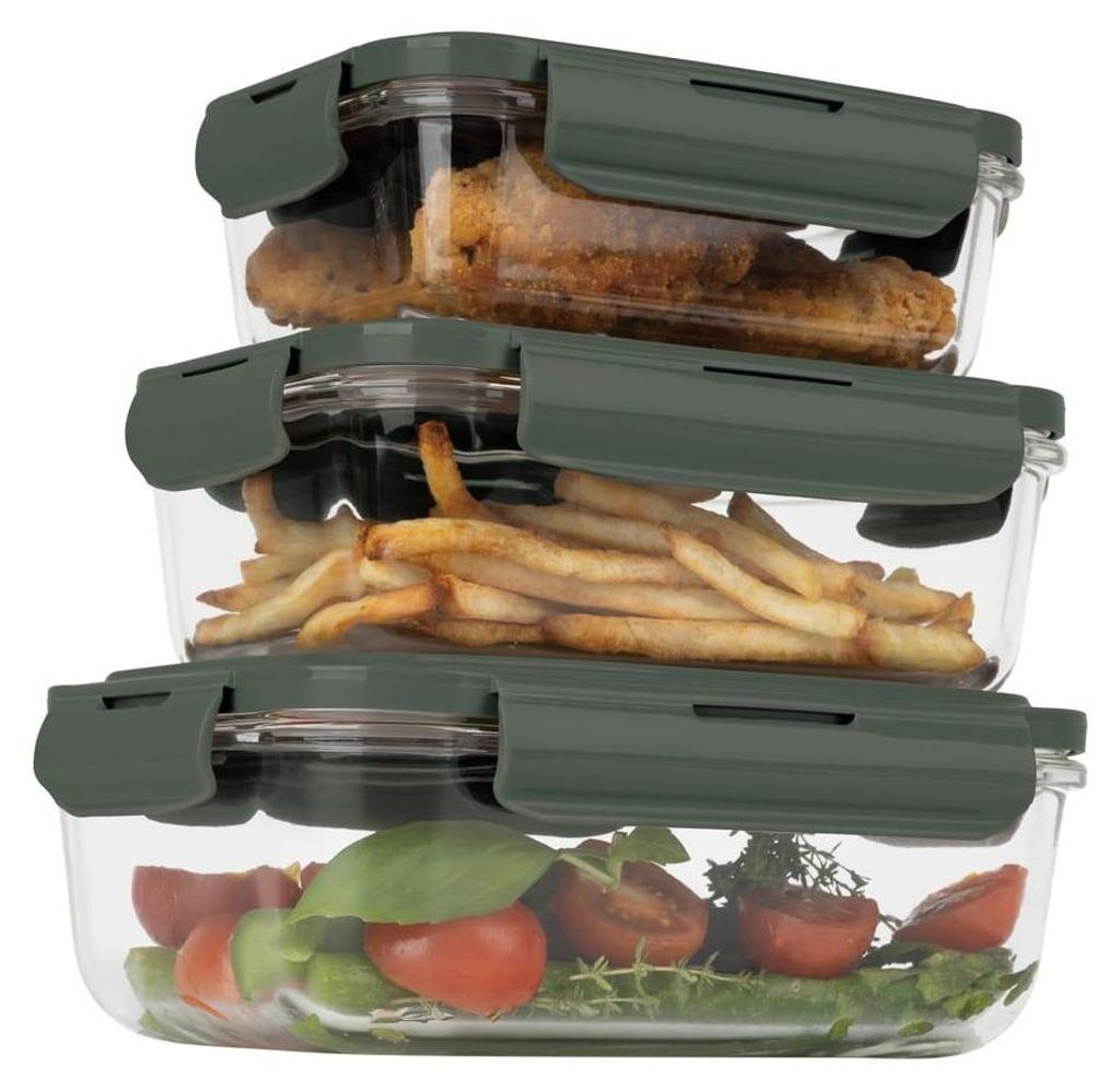 Three stacked glass food storage containers with green lids.