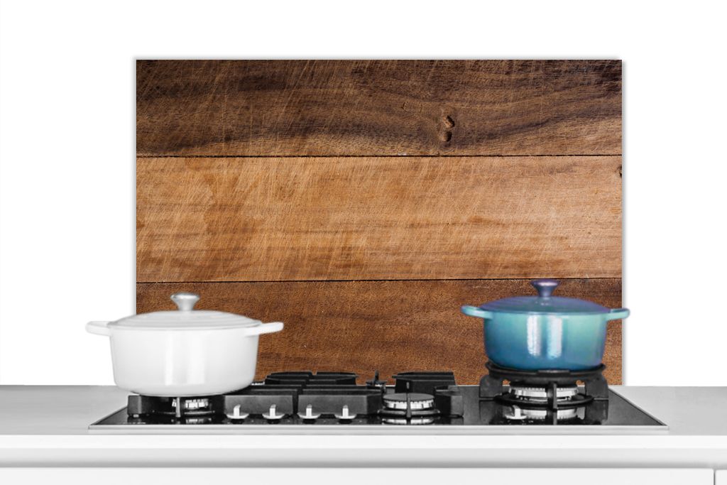 KitchenYeah Spritzschutz Küche - Küchenrückwand - Wandschutz für Herd und Spüle - Ein Bild eines en Holzschneidebretts mit verschiedenen Me...