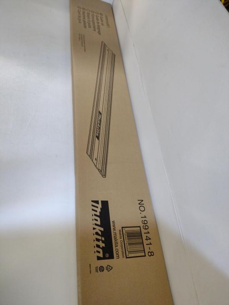 A long cardboard box with product information printed on it.