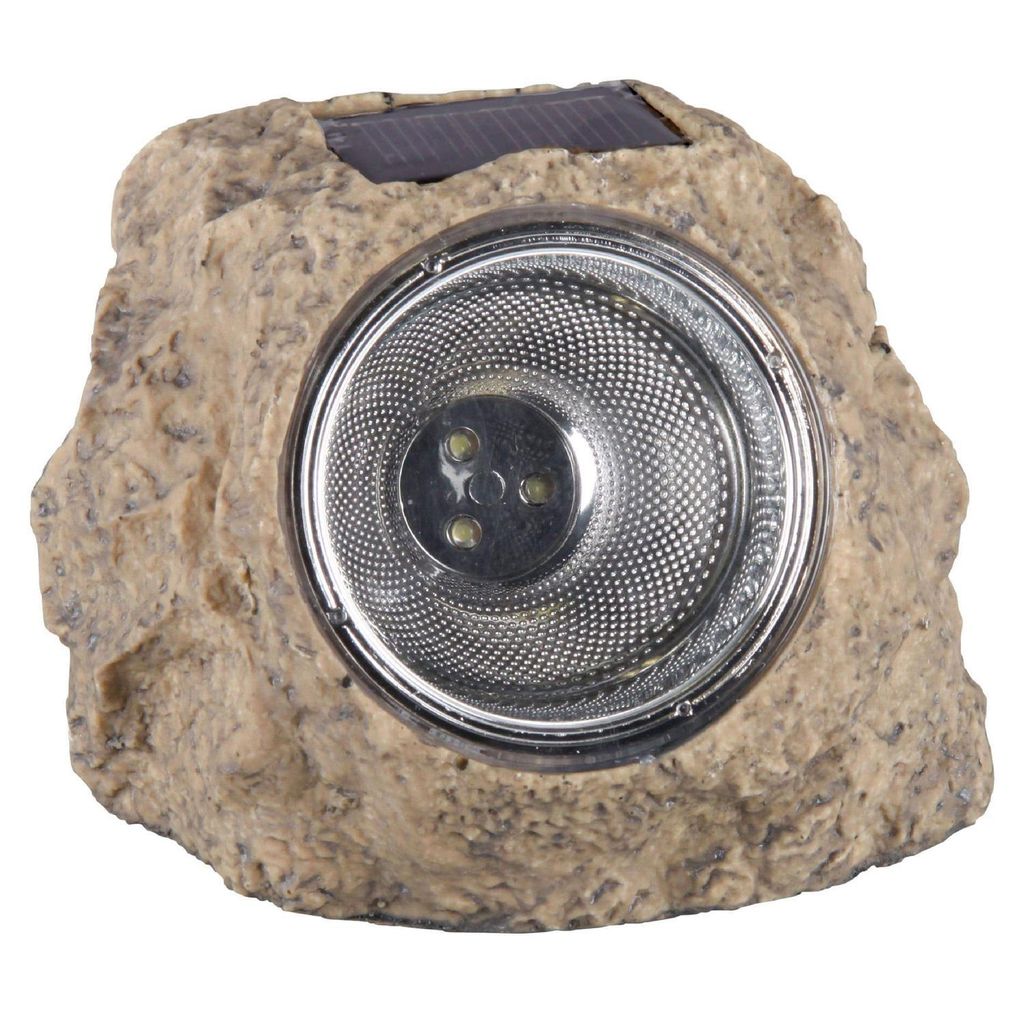 A solar-powered garden light designed to look like a rock.
