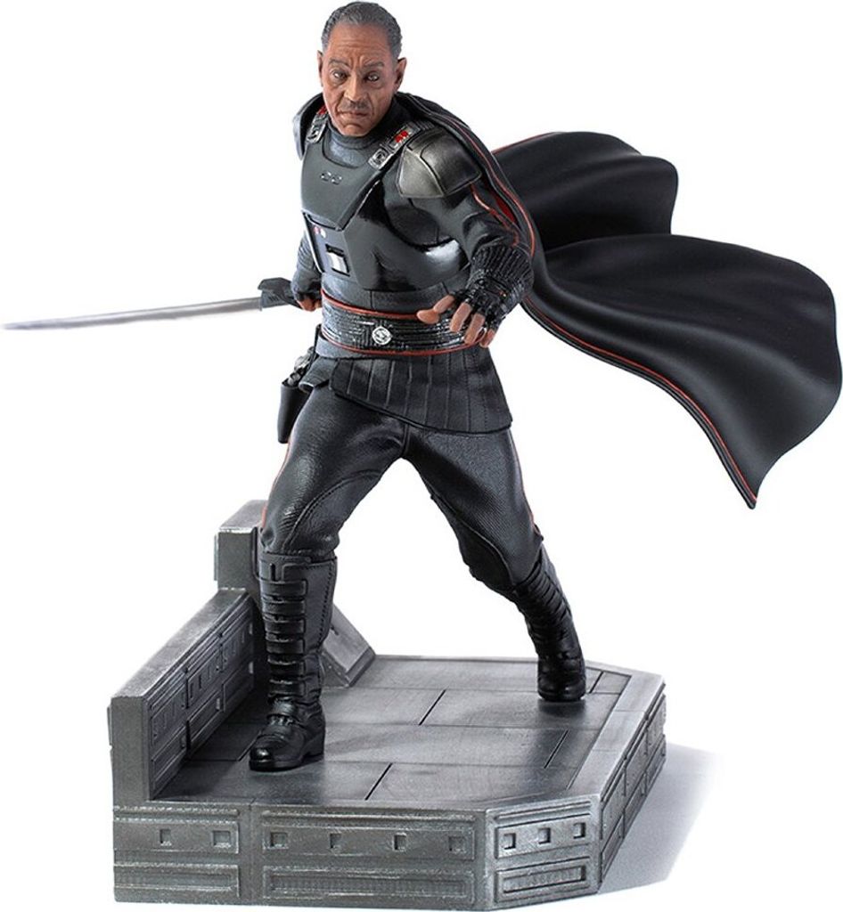 A statue of Moff Gideon from Star Wars, holding a lightsaber and standing on a platform.