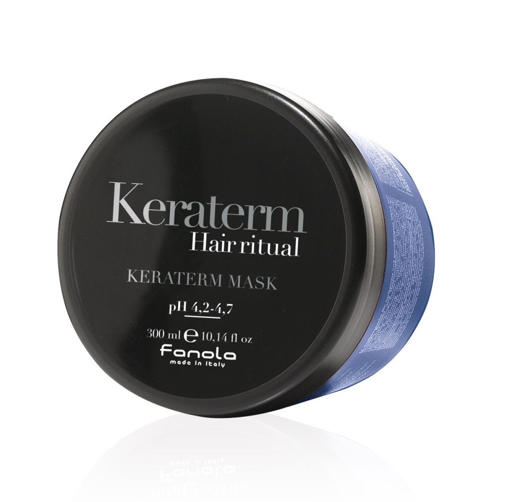 A black tub of Fanola Keraterm hair mask with blue accents on a white background.