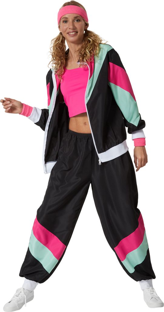 A woman is posing in a retro 80s/90s style tracksuit.