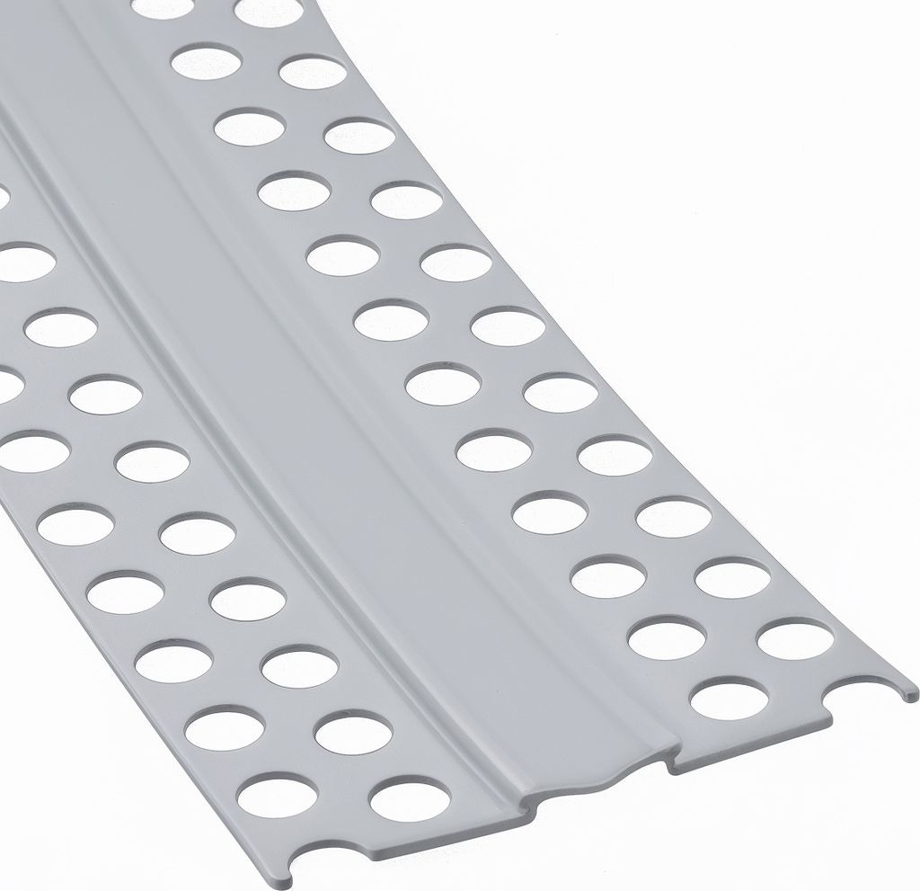 A close-up, angled view of a light gray PVC expansion joint profile with circular perforations.
