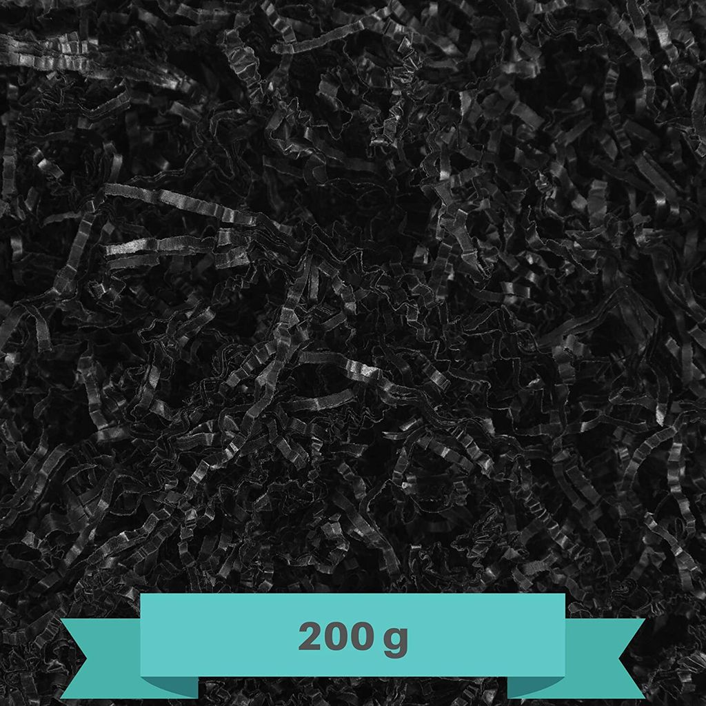 A close-up, overhead view of black shredded paper filling material.