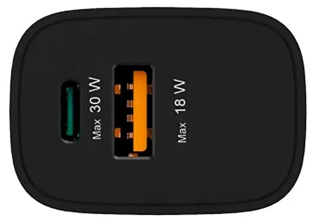 Close-up view of a black USB charger with two ports.