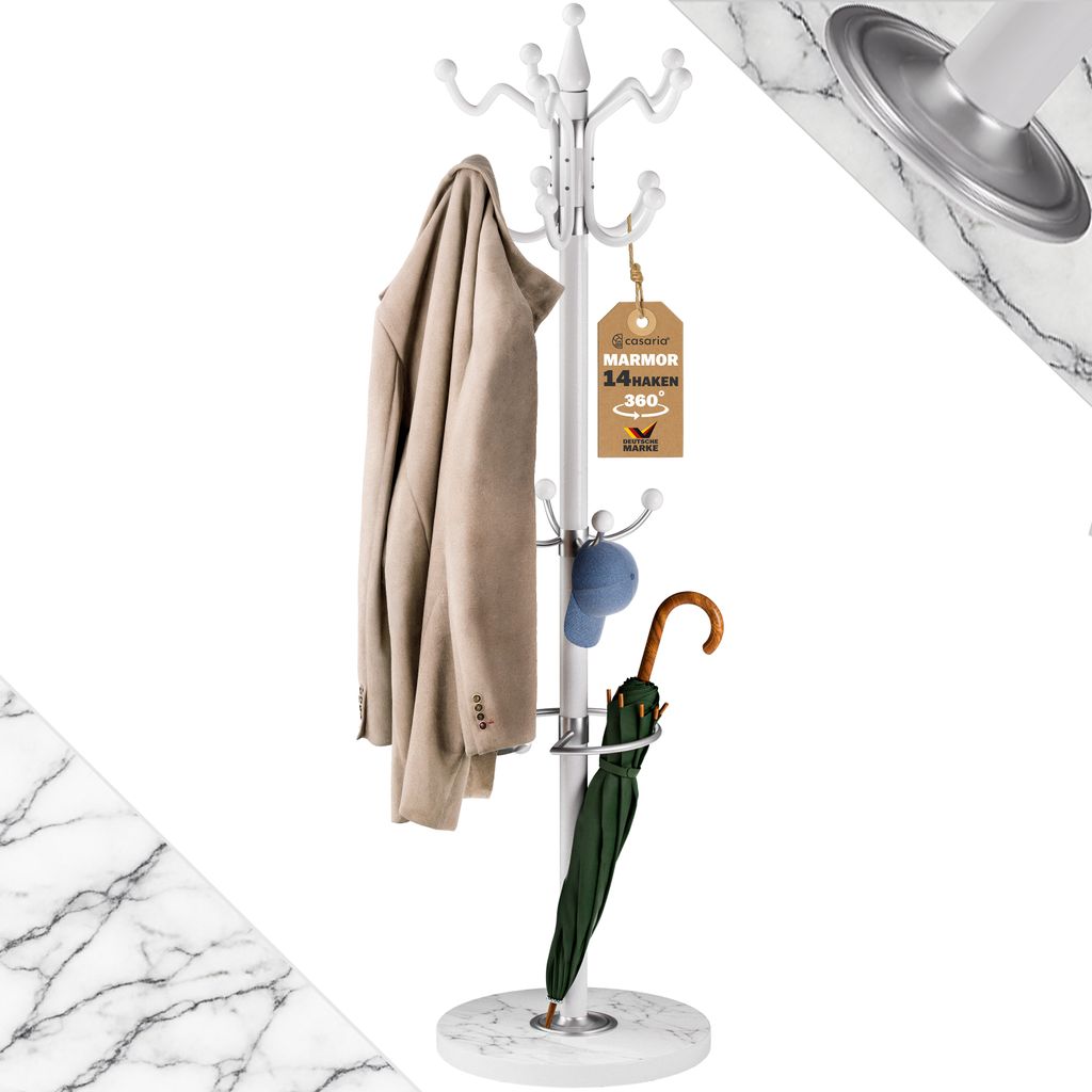 A white coat rack with a marble base, featuring a beige jacket, a blue cap, and a green umbrella.