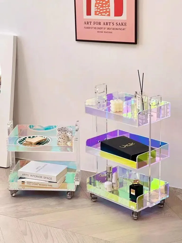 Petite table basse transparente pour gagner de l'espace sur roulettes - 2