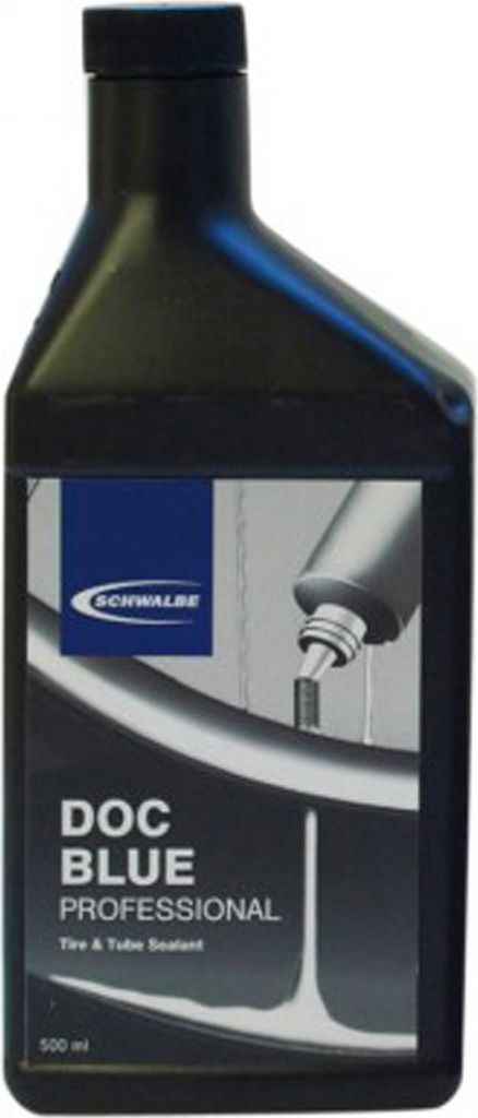 A black bottle of Schwalbe Doc Blue Professional Tire & Tube Sealant.