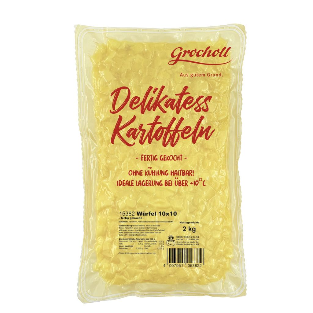 A vacuum-sealed bag of diced potatoes on a white background.
