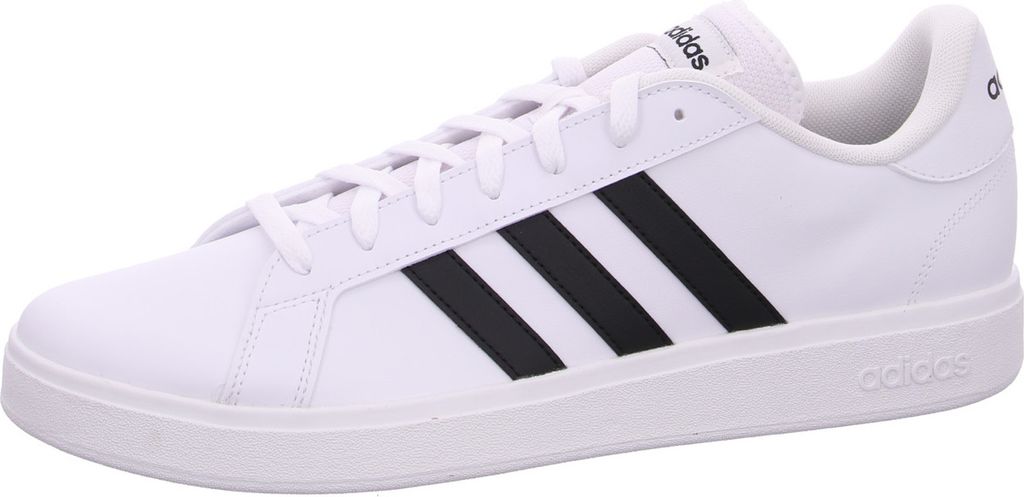 A white Adidas sneaker with black stripes is shown against a white background.