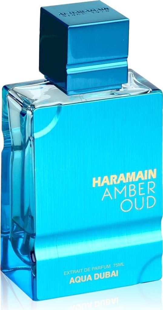 A product shot of a blue glass perfume bottle with a blue cap.