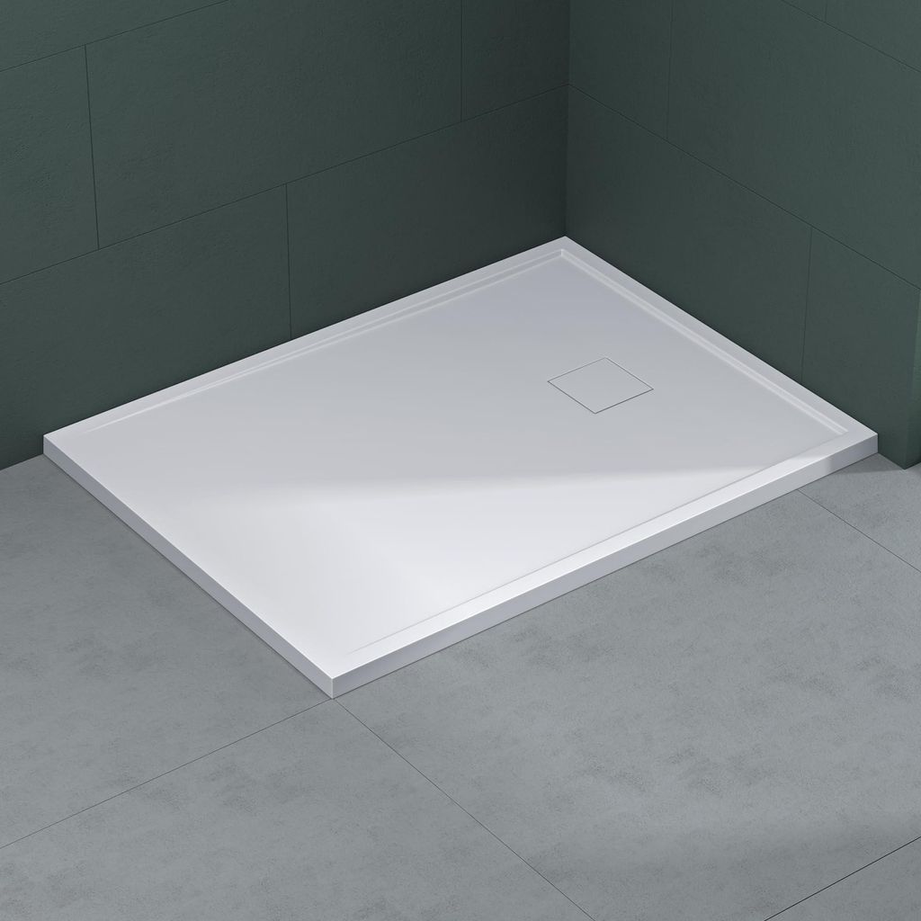 A white shower tray is shown in a bathroom corner, with dark green tiled walls and gray tiled floor.