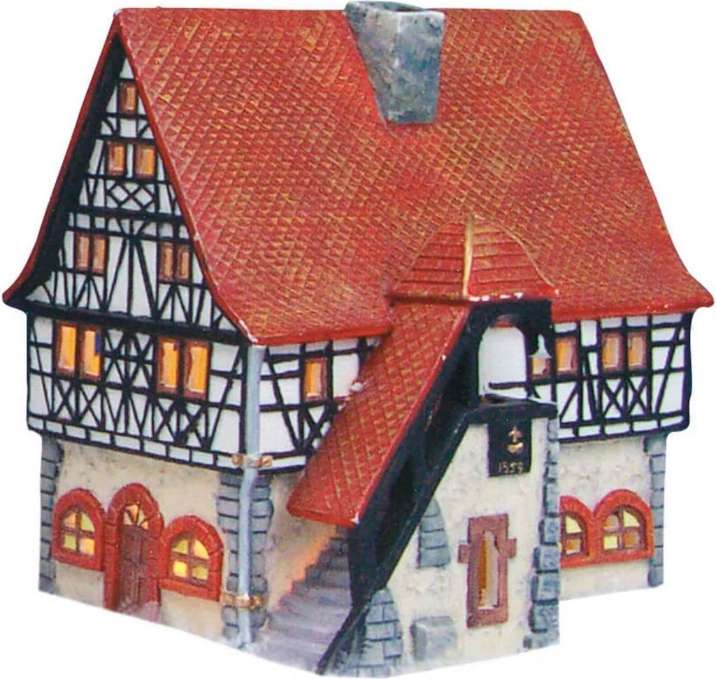 A miniature model of a historic town hall building.