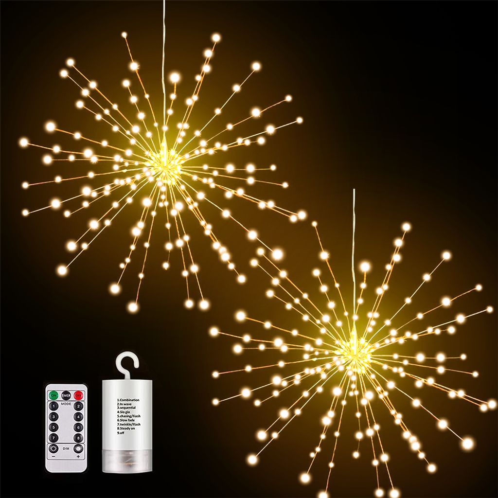 Two starburst-shaped string lights with warm white LEDs against a dark background, with a remote control and battery pack shown in the lower left corner.