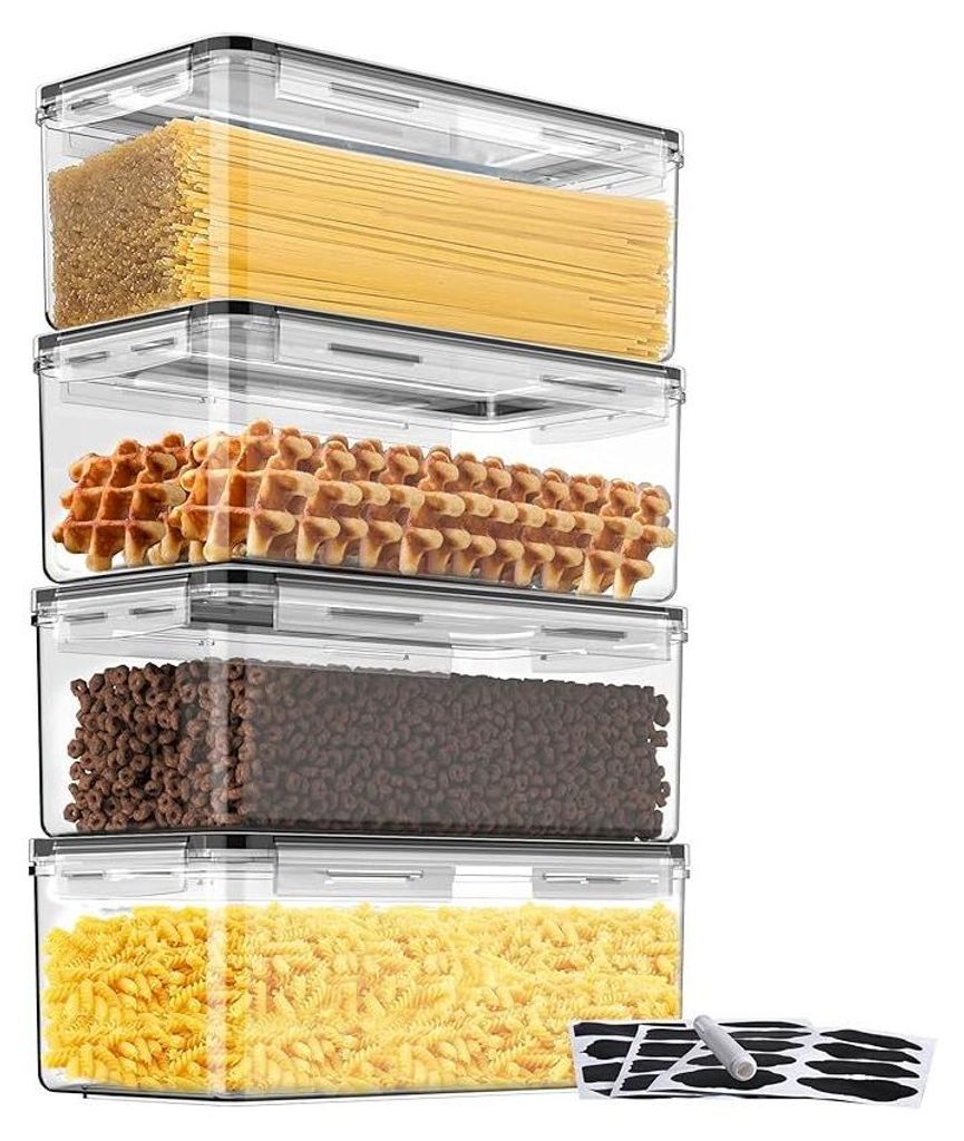 Four clear plastic food storage containers stacked vertically, filled with different food items.